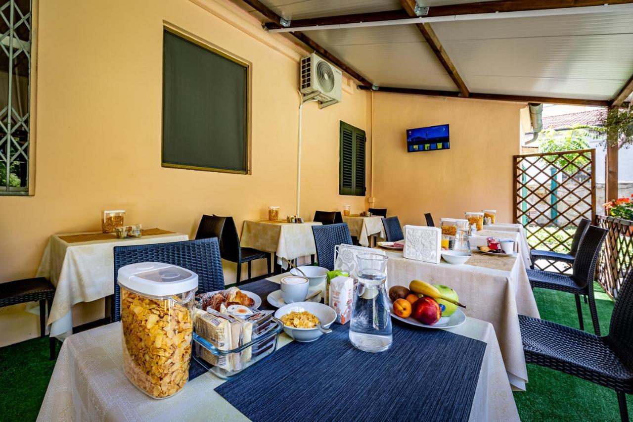 Hotel Minerva Пиза Экстерьер фото